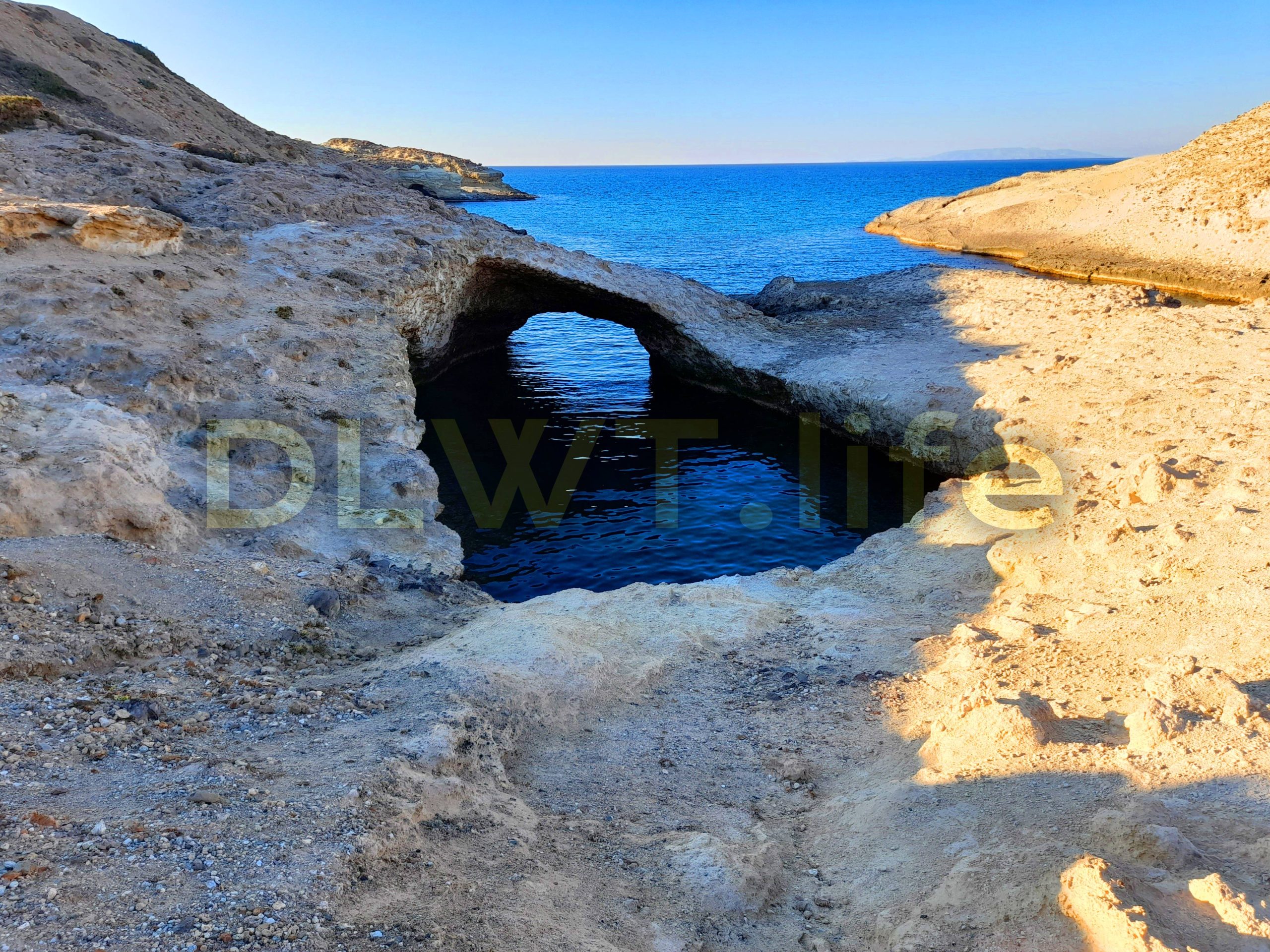 Kapros beach and sea caves