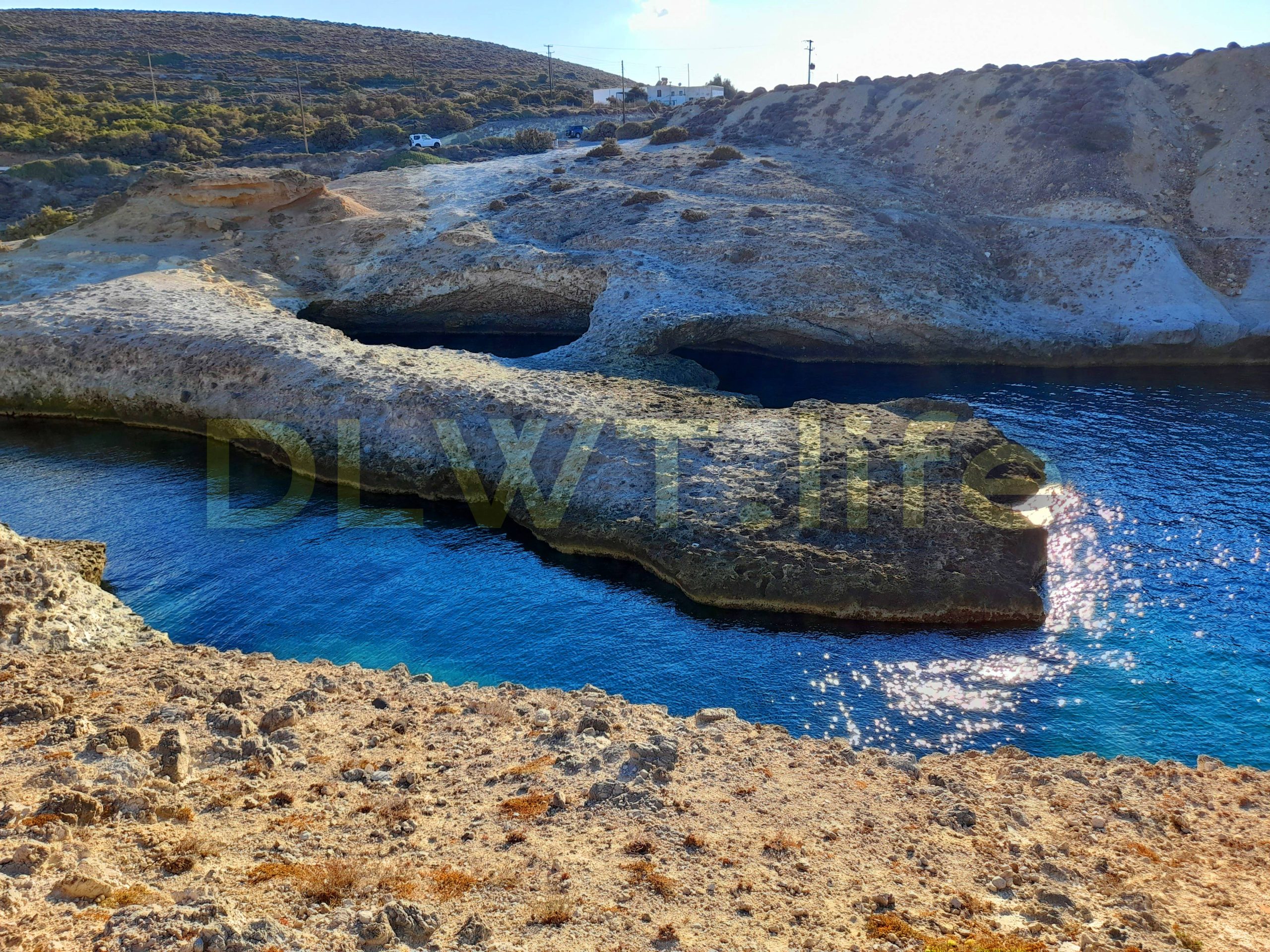 Kapros beach and sea caves